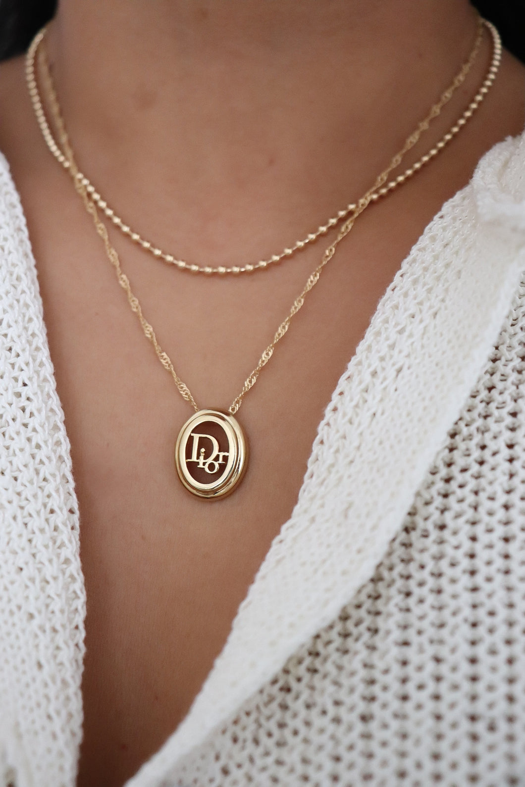 Dior golden pendant