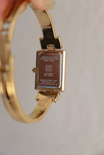Load image into Gallery viewer, Vintage Givenchy 1990s Emerald Dial Gold Plated Bangle Watch
