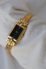 Load image into Gallery viewer, Vintage Givenchy 1990s Black Dial Gold Plated Bangle Watch
