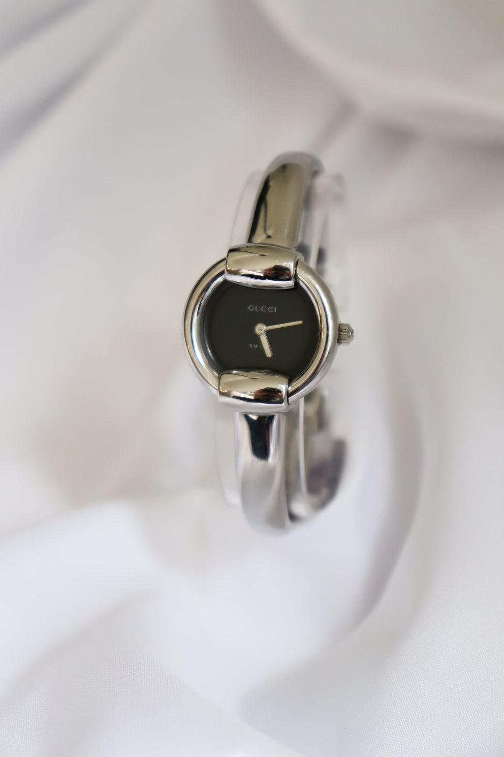 Vintage Gucci Bangle Watch in silver with black dial