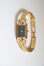 Load image into Gallery viewer, Vintage Givenchy 1990s Black Dial Gold Plated Bangle Watch
