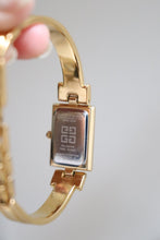 Load image into Gallery viewer, Vintage Givenchy 1990s Black Dial Gold Plated Bangle Watch
