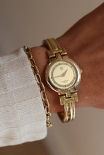Load image into Gallery viewer, Rare Vintage Givenchy 1990s Gold Round Dial Bangle Watch with crystals
