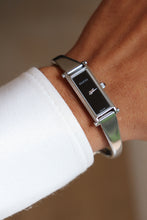Load image into Gallery viewer, Vintage Gucci Bangle Watch in silver with black dial
