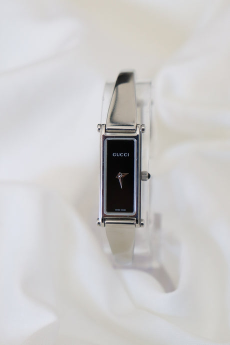 Vintage Gucci Bangle Watch in silver with black dial