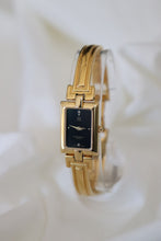 Load image into Gallery viewer, Vintage Givenchy 1990s Black Dial Gold Plated Bangle Watch
