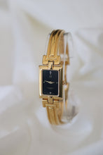 Load image into Gallery viewer, Vintage Givenchy 1990s Black Dial Gold Plated Bangle Watch
