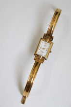 Load image into Gallery viewer, Vintage Givenchy Millesime Gold Bangle Watch
