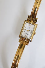 Load image into Gallery viewer, Vintage Givenchy Millesime Gold Bangle Watch
