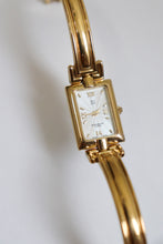 Load image into Gallery viewer, Vintage Givenchy Millesime Gold Bangle Watch
