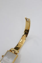 Load image into Gallery viewer, Vintage Givenchy Millesime Gold Bangle Watch
