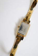 Load image into Gallery viewer, Vintage Givenchy Millesime Gold Bangle Watch
