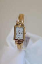 Load image into Gallery viewer, Vintage Givenchy Millesime Gold Bangle Watch
