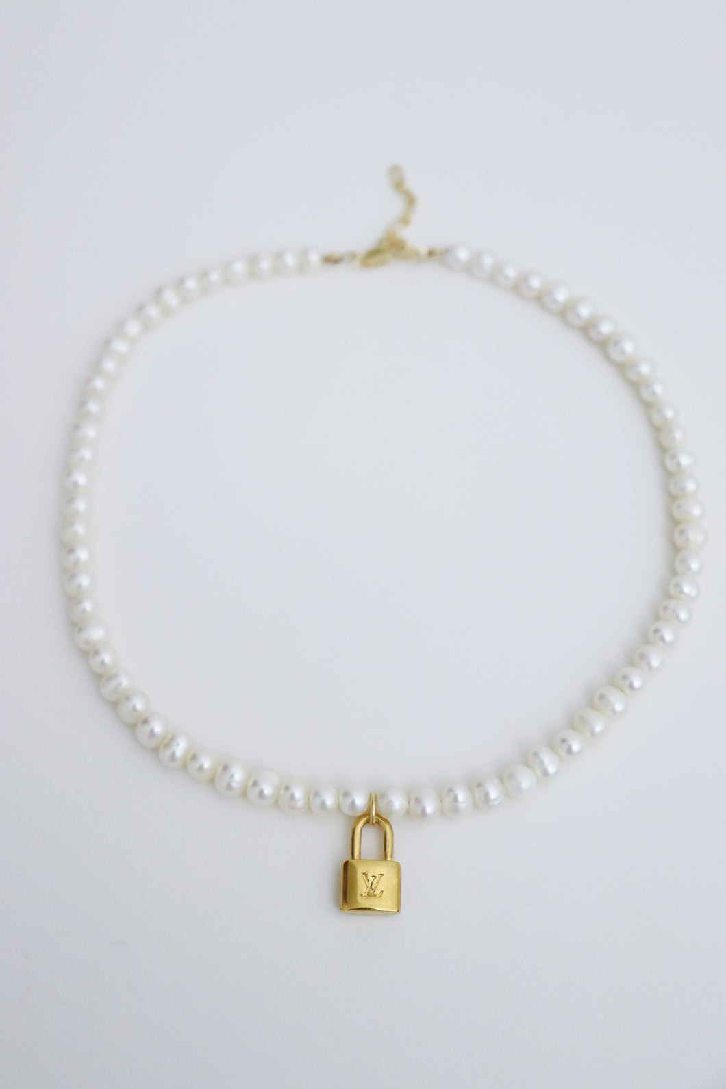 Louis Vuitton mini lock with freshwater pearls