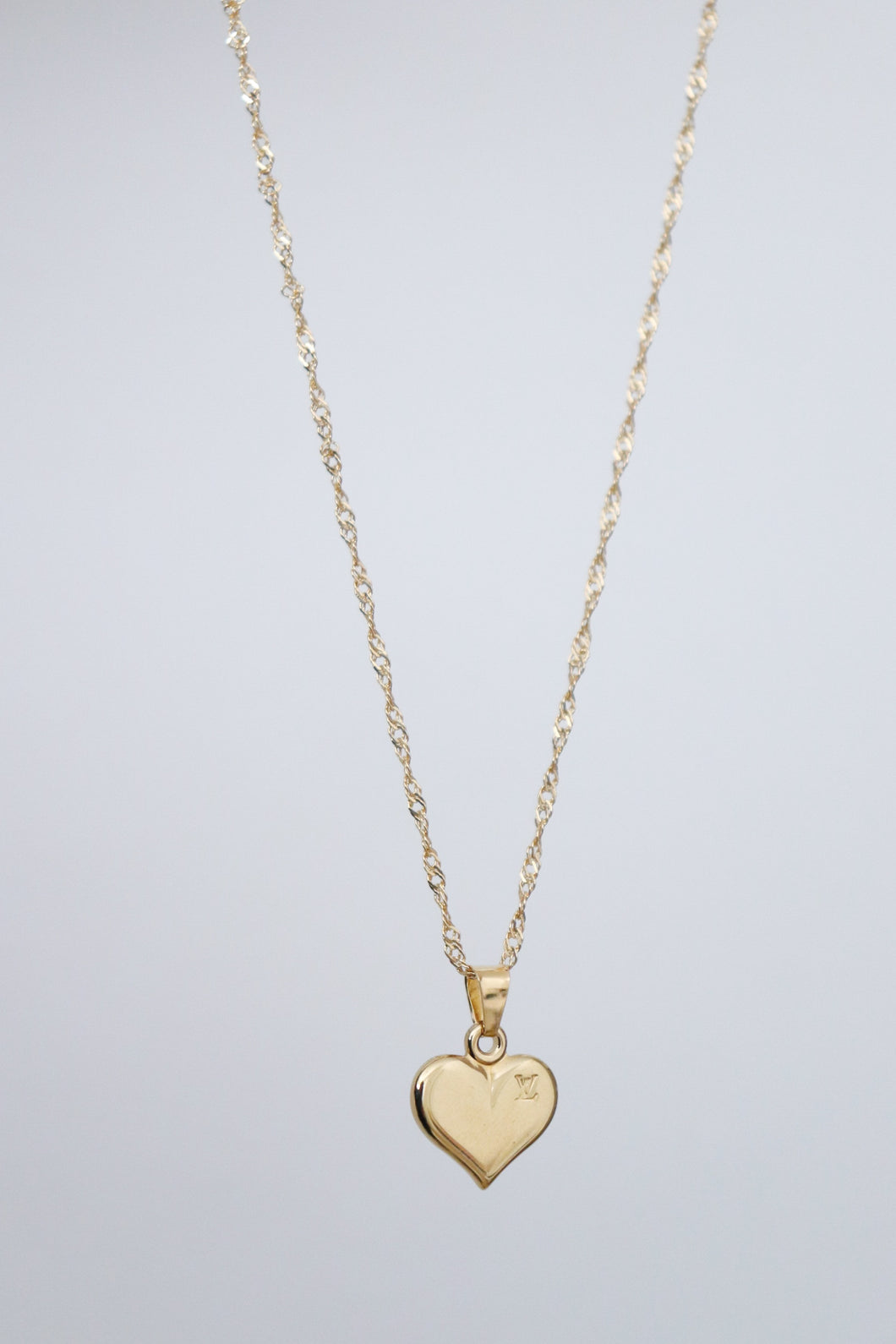 Louis Vuitton mini heart with gold filled chain