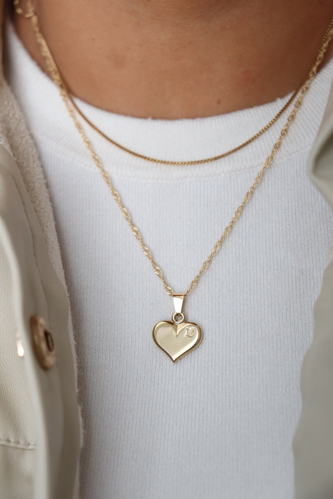 Louis Vuitton small heart with gold filled chain