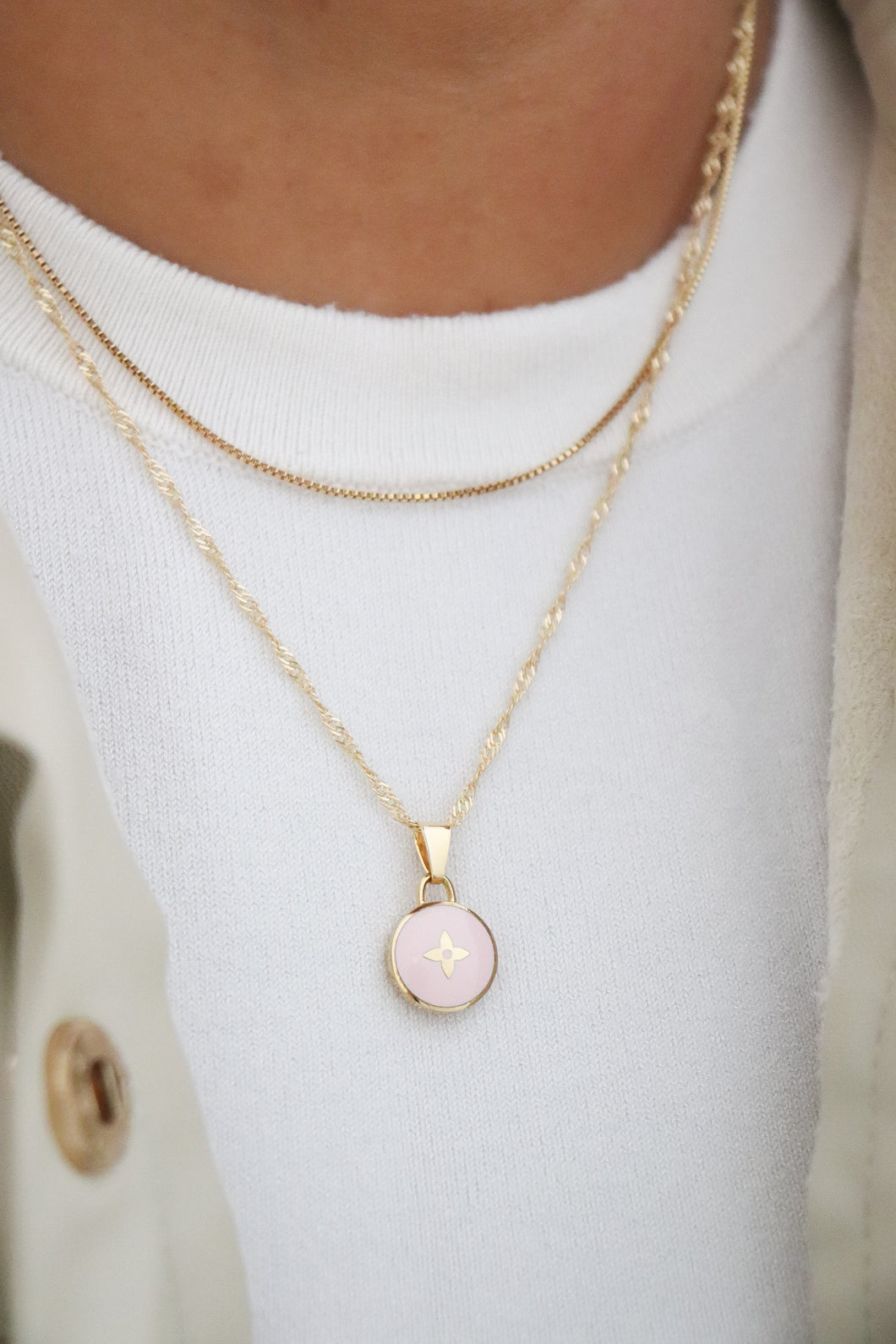 Louis Vuitton fleur de lis in light pink