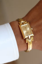 Load image into Gallery viewer, givenchy vintage gold rectangle watch with 2 diamonds 
