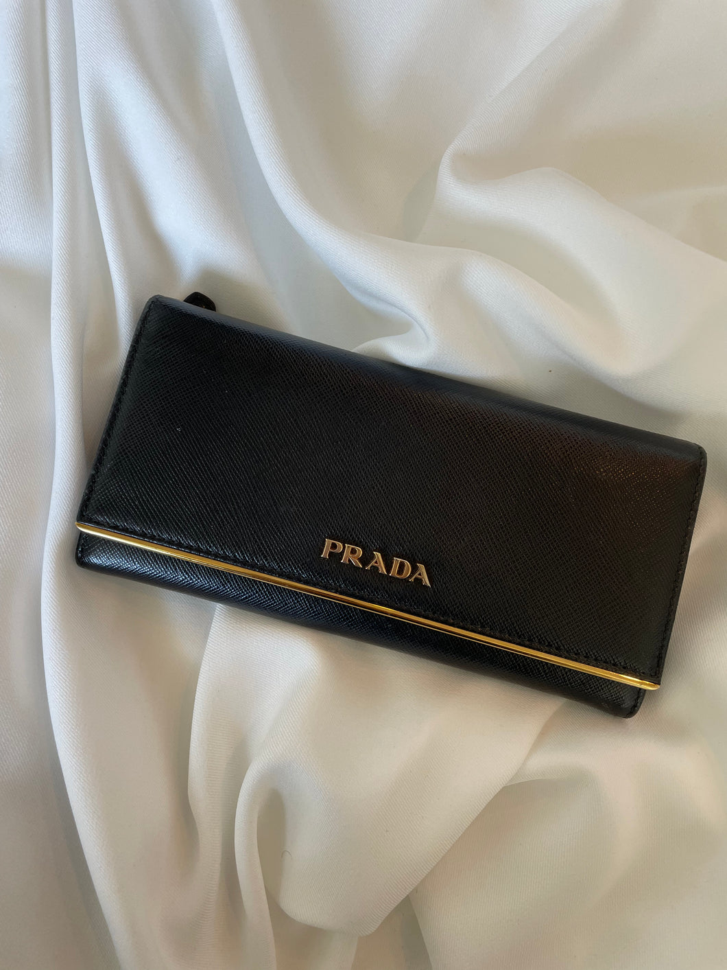 Black Prada leather continental wallet